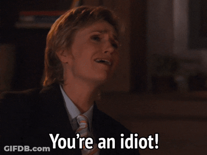 Lady In Suit Said What An Idiot GIF