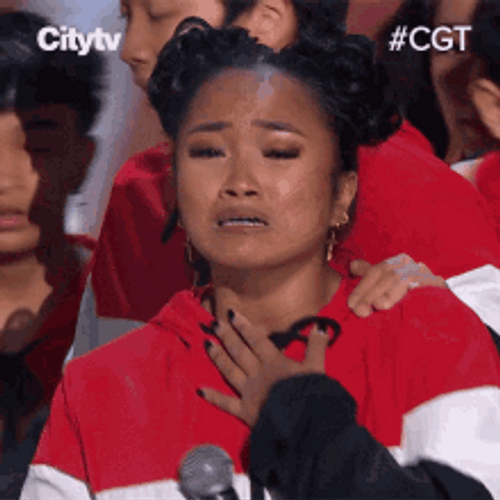 Lady In Tears Of Joy During A Competition GIF
