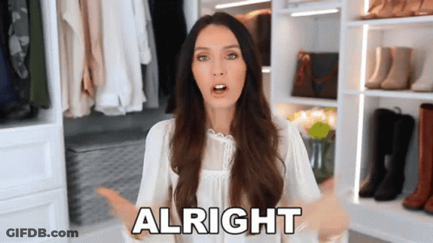 Lady In White Saying Alright GIF