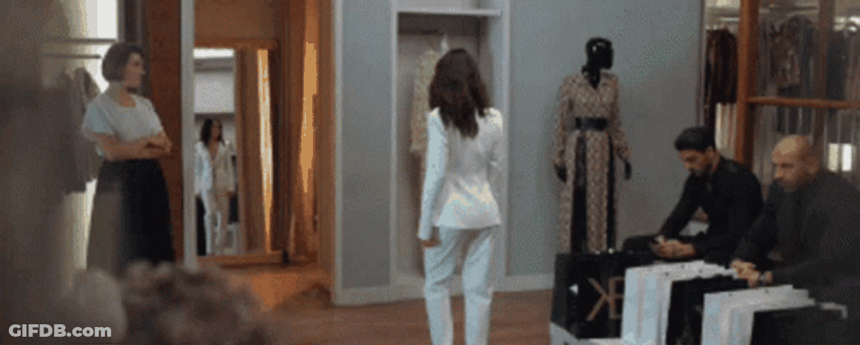 Lady In White Suit Walking Away GIF
