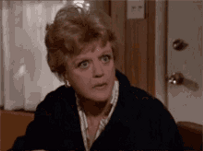 Lady Interested Eating Popcorn GIF