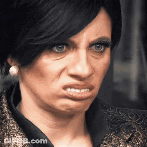 Lady Looking Around With Eww Facial Expression GIF
