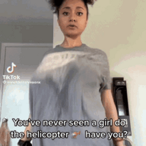 Lady Making Big Boobs Helicopter Spin GIF