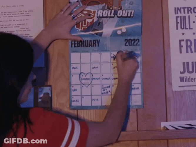 Lady Marking Calendar With X GIF