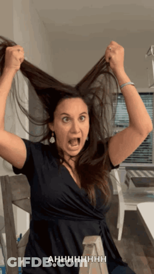 Lady Pulling Own Hair Out GIF