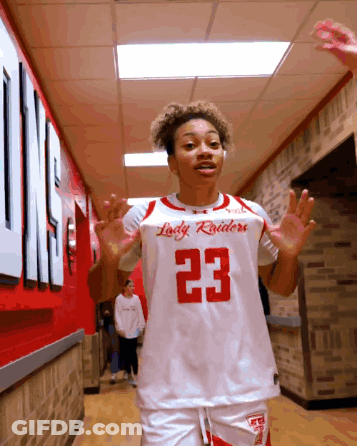 Lady Raiders Basketball Player With Hands In Air GIF