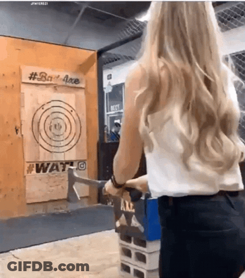 Lady's Bad Aim To Darts GIF