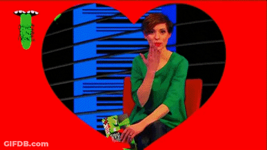 Lady Sending Kisses In Colorful Art GIF