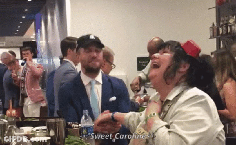 Lady Sings Sweet Caroline GIF