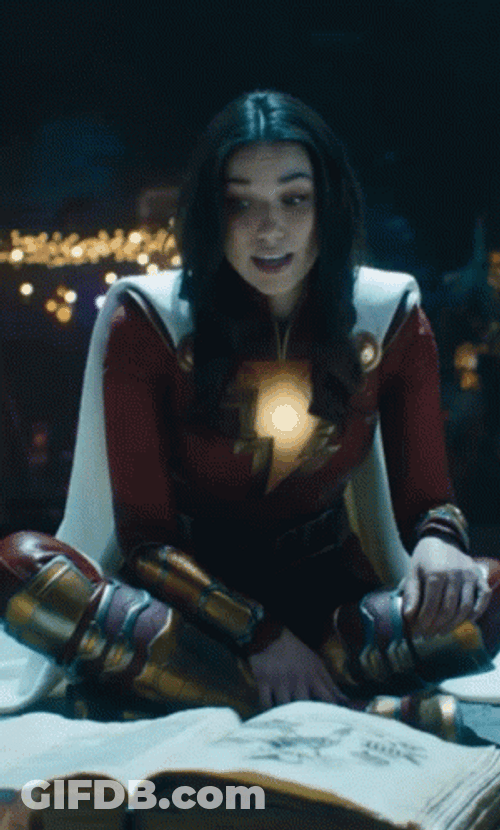 Lady Sitting Shazam GIF