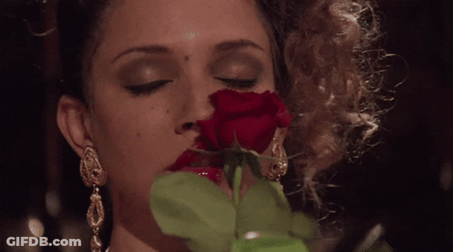 Lady Sniff A Rose GIF