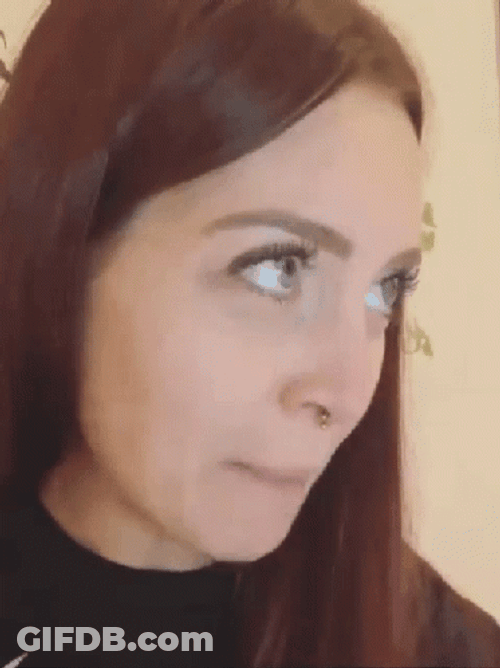 Lady Talking Facing The Phone GIF