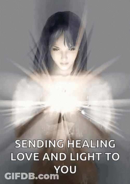 Lady With Shining Hands Sending Healing Vibes GIF