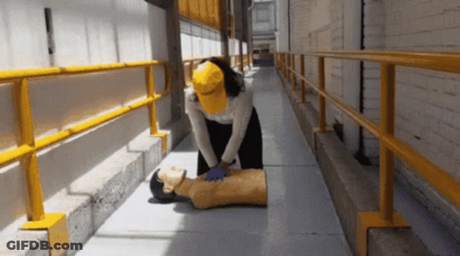 Lady Worker Practicing Cpr GIF