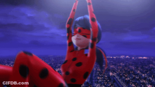 Ladybug Giving Peace Sign In City GIF