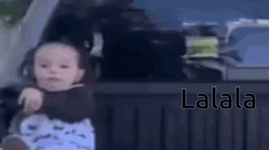 Lalala Reaction Of Baby Girl Sitting Peacefully GIF