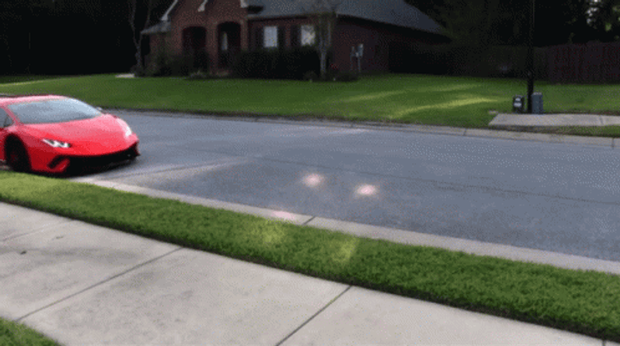 Lamborghini Red Huracan Pulling Over GIF