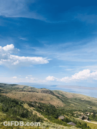 Landscape With Blue Sky And Clouds GIF