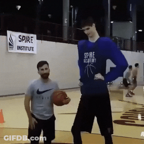 Lanky Man Shoots Ball Easily GIF