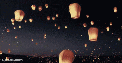 Lanterns Floating In Night Sky GIF