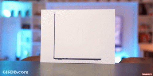 Laptop In White Box With Thinkfiles GIF