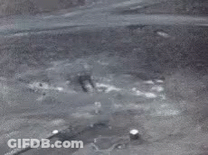 Large Black And White Hole In Ground GIF