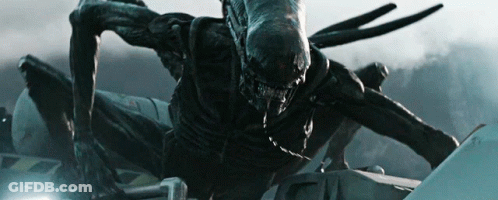 Large Black Monster With Long Neck Crawling On Vehicle GIF