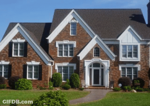 Large Brick House With Gray Roof And Windows GIF
