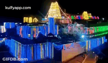 Large Building Lit Up At Night GIF