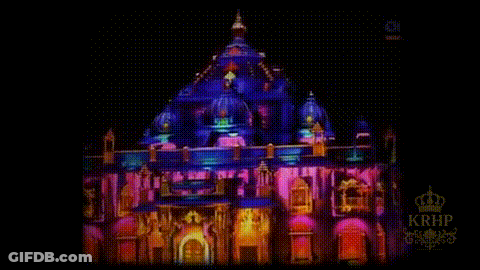 Large Building Lit Up At Night With KRHP GIF