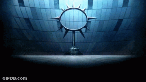 Large Circular Spiked Object In Dark Room GIF