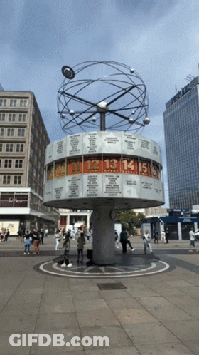 Large Clock Displays Time In City GIF