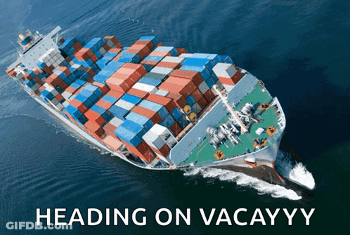Large Container Ship Heading On Vacayy In Ocean GIF