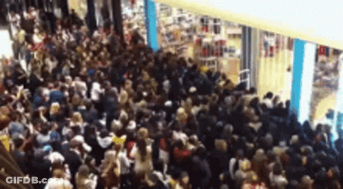 Large Crowd Gathered In Mall GIF