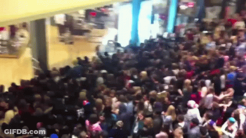 Large Crowd In Mall GIF