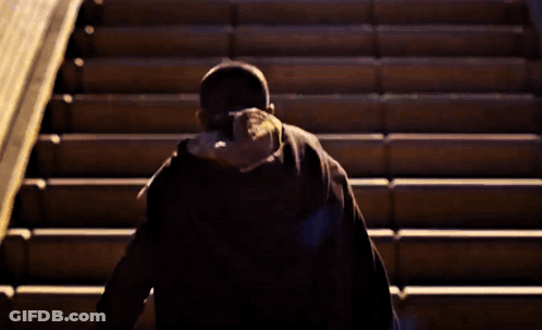 Large Crowd In Stadium Saying Beat Michigan GIF