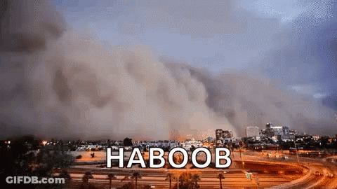 Large Dust Cloud Blowing Over City Haboob GIF