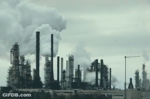 Large Factory With Smoking Chimneys GIF