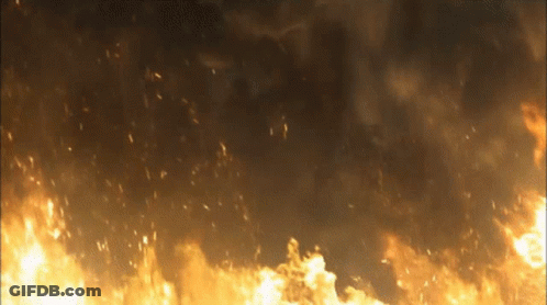 Large Fire Burning In Dark Night Sky GIF