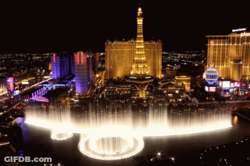 Large Fountain In Front Of Building With Palazzo GIF
