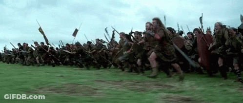 Large Group Of Soldiers Running Through Field GIF