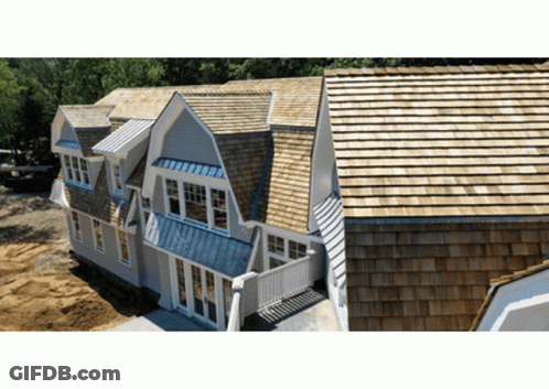 Large House With Wooden And Blue Roof GIF