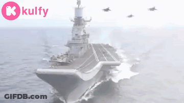 Large Military Ship Floating On Water GIF
