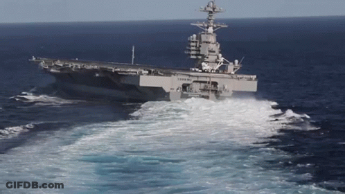 Large Military Ship USS Floating In Ocean GIF