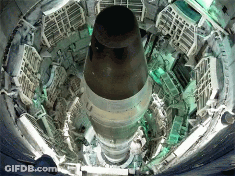Large Nuclear Rocket Being Built In Large Room GIF