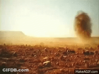 Large Rock Blown By Wind In Desert GIF
