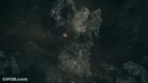 Large Rock With Glowing Eye In Dark GIF