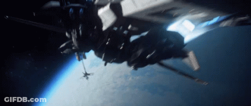 Large Space Ship Flying Over Earth GIF