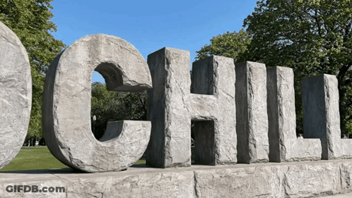 Large Stone Sculpture Of The Word Chili GIF