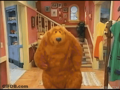 Large Teddy Bear Standing In Hallway GIF